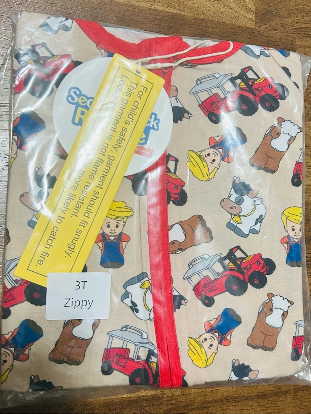 Kids' Zippy Pajamas - Beige Farm Print with Red Trim